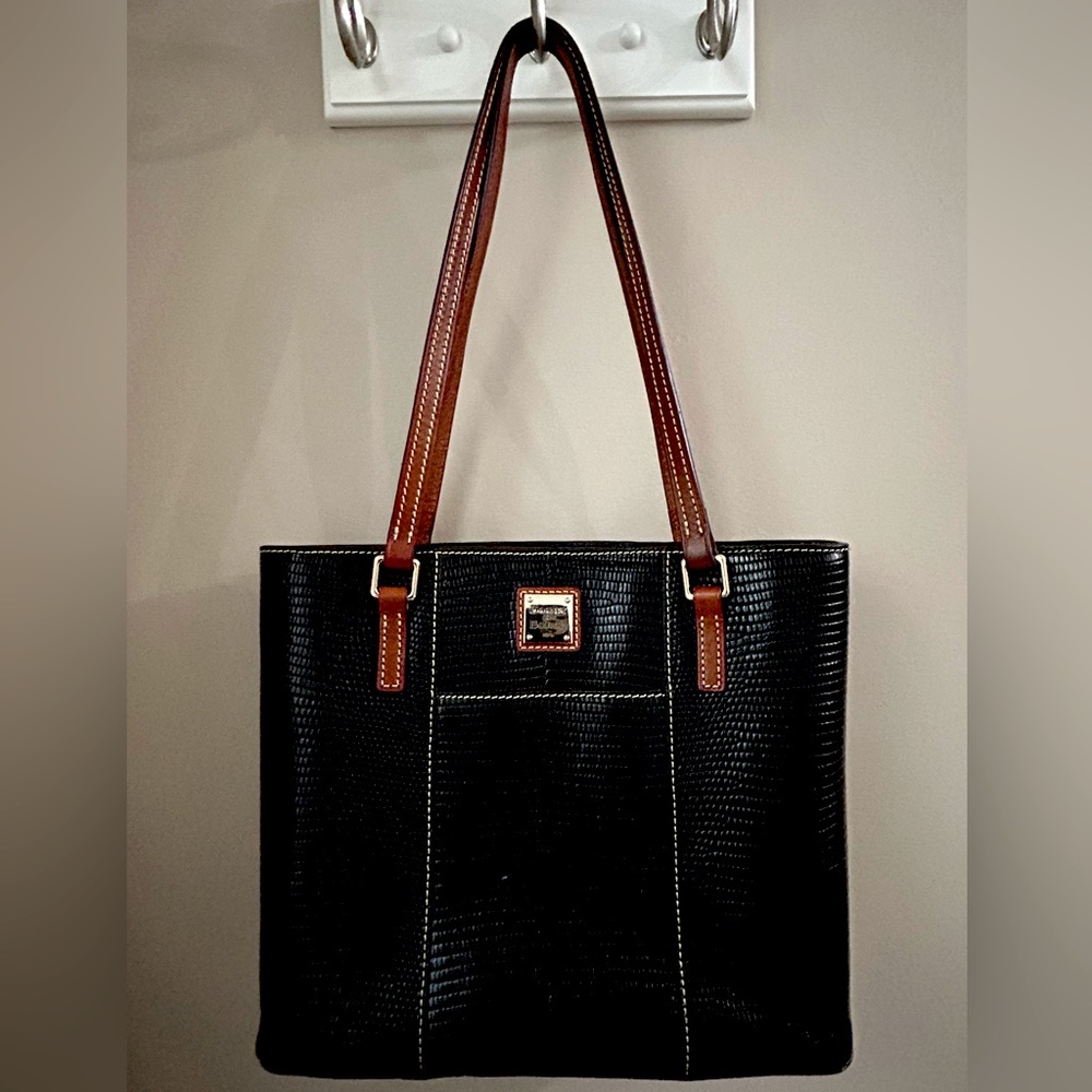 * Dooney and Bourke long-lasting pebble leather tote. Like-new. Only used once.